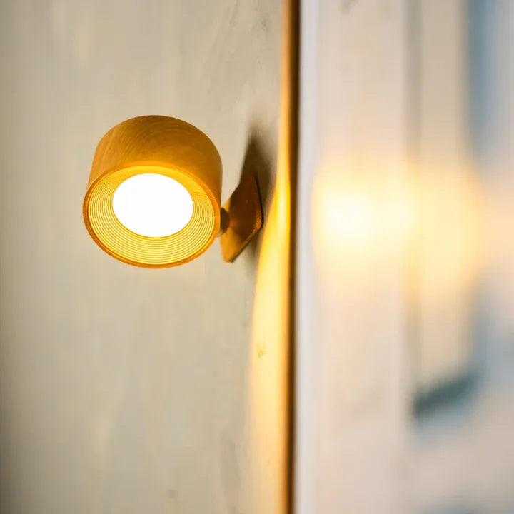 Vela cordless wall light glowing warm