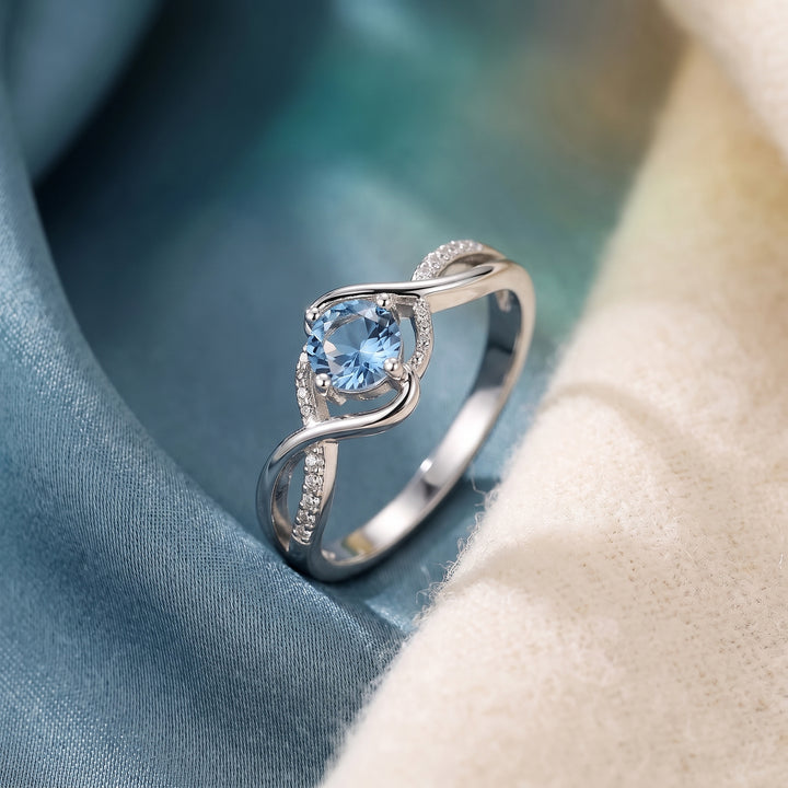 Lunara Wave Infinity Ring with flowing infinity curves