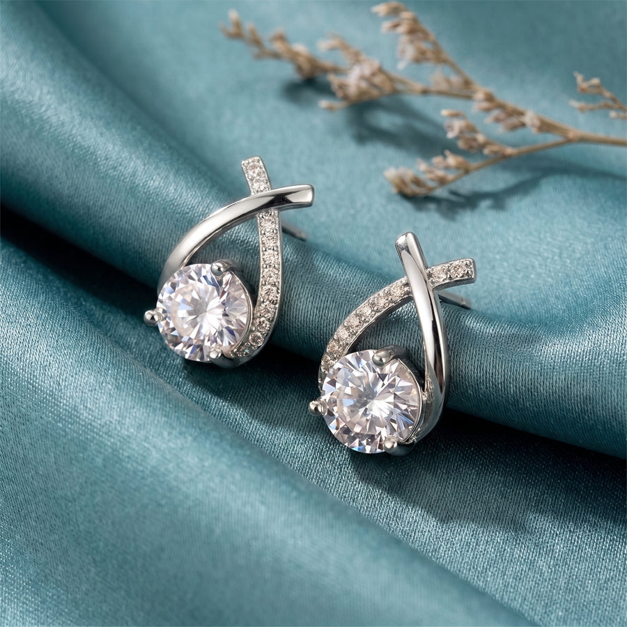 Lucienne Crystal Arc Studs in silver on fabric